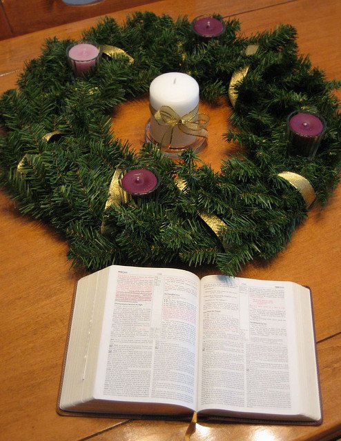 Unlit Candles in Advent wreath with Bible
