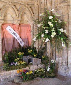 Easter Flower Display An Easter floral display with a banner reading "Resurrection" and incorporating a cave with the stone rolled away
